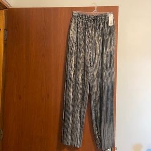 Black and silver pleated palazzo , size small, merchandise new with ticket.